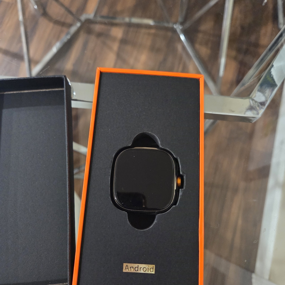 Source Unknown Black and Orange Smartwatch